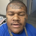 Crip Mac Face Tattoos